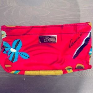 Gucci pink floral cosmetic bag. Excellent condition.